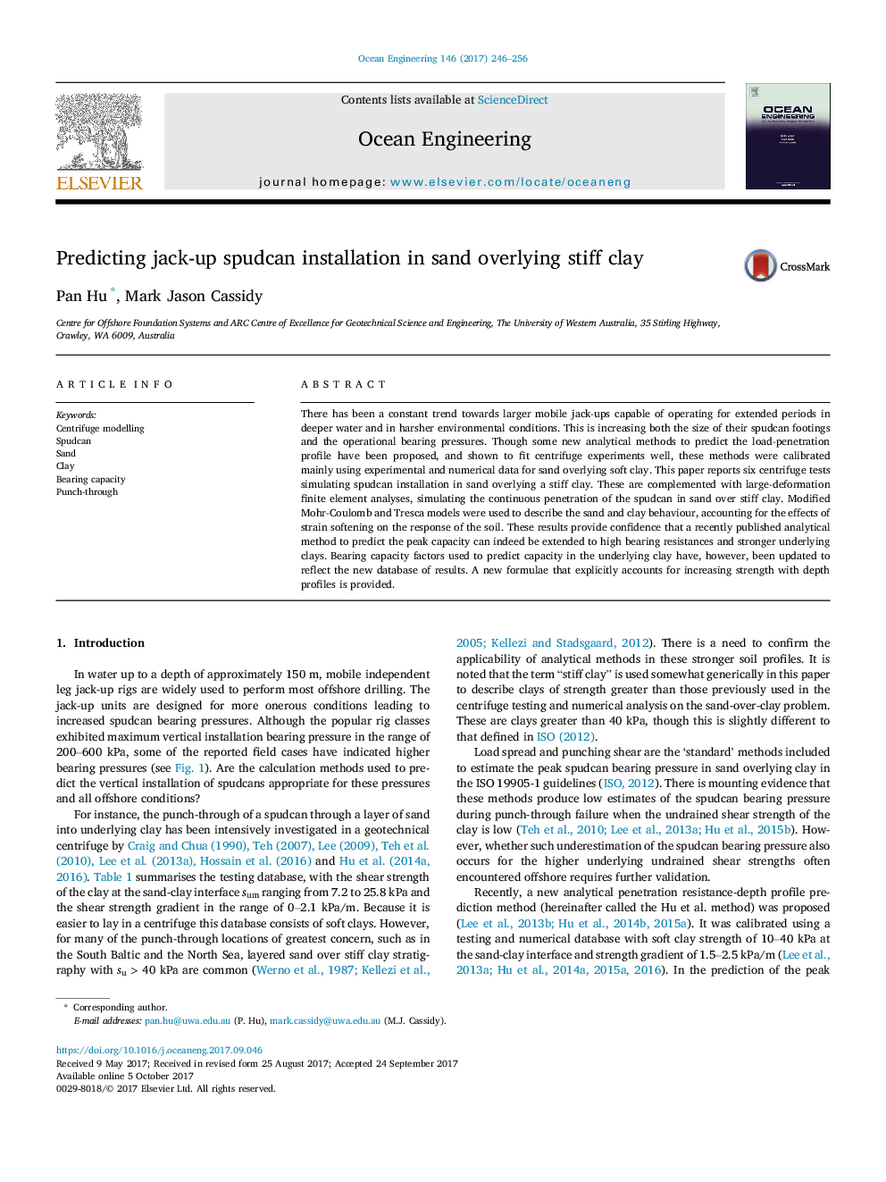 Predicting jack-up spudcan installation in sand overlying stiff clay