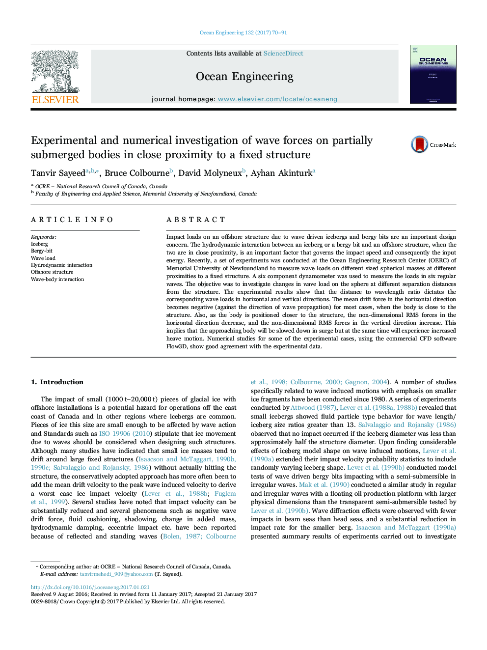 Experimental and numerical investigation of wave forces on partially submerged bodies in close proximity to a fixed structure