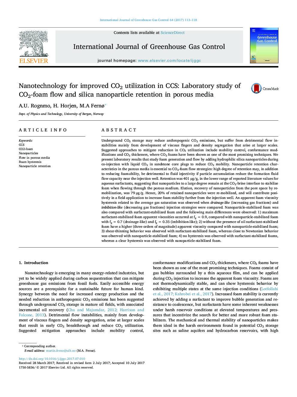 Nanotechnology for improved CO2 utilization in CCS: Laboratory study of CO2-foam flow and silica nanoparticle retention in porous media