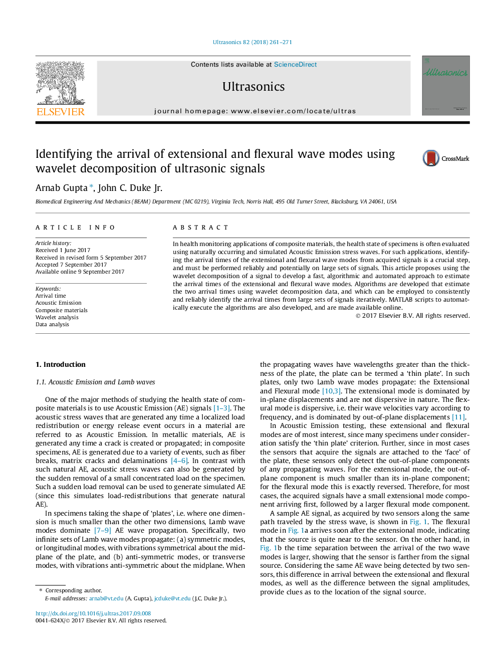 Identifying the arrival of extensional and flexural wave modes using wavelet decomposition of ultrasonic signals