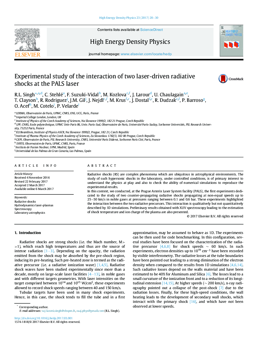 Experimental study of the interaction of two laser-driven radiative shocks at the PALS laser