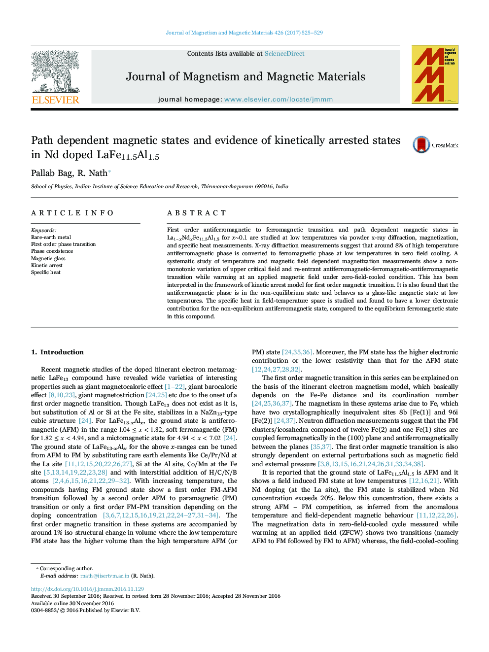 Path dependent magnetic states and evidence of kinetically arrested states in Nd doped LaFe11.5Al1.5