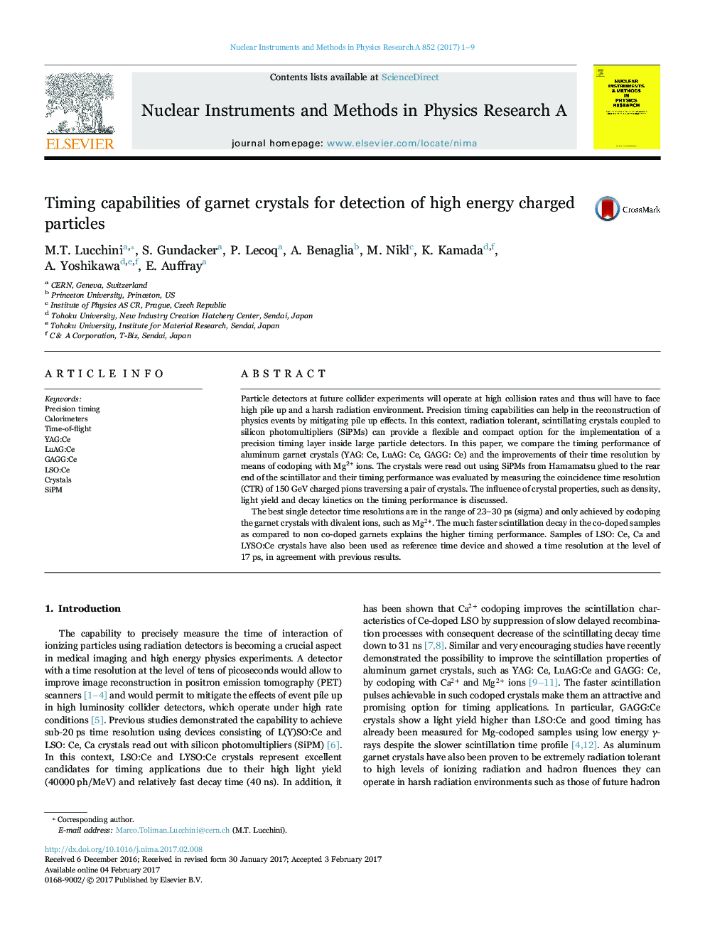 Timing capabilities of garnet crystals for detection of high energy charged particles