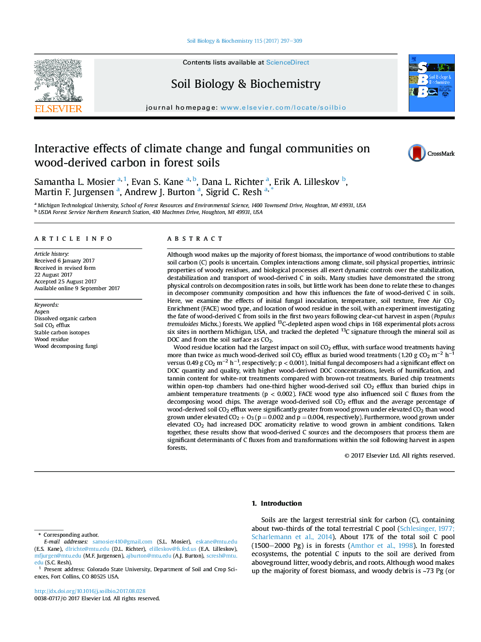 Interactive effects of climate change and fungal communities on wood-derived carbon in forest soils