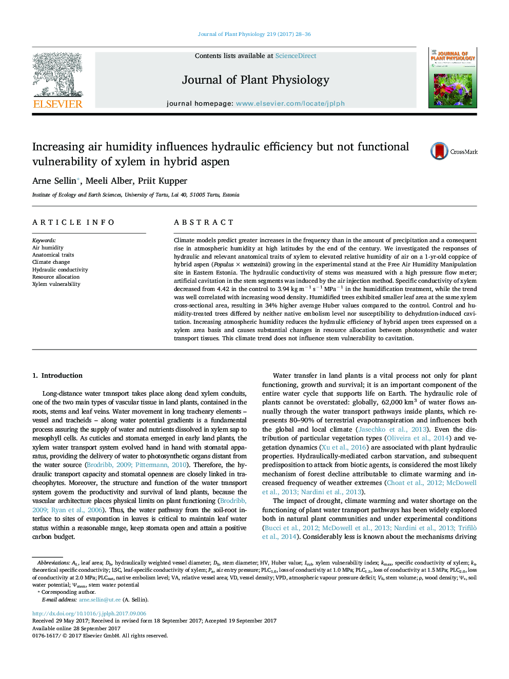 Increasing air humidity influences hydraulic efficiency but not functional vulnerability of xylem in hybrid aspen