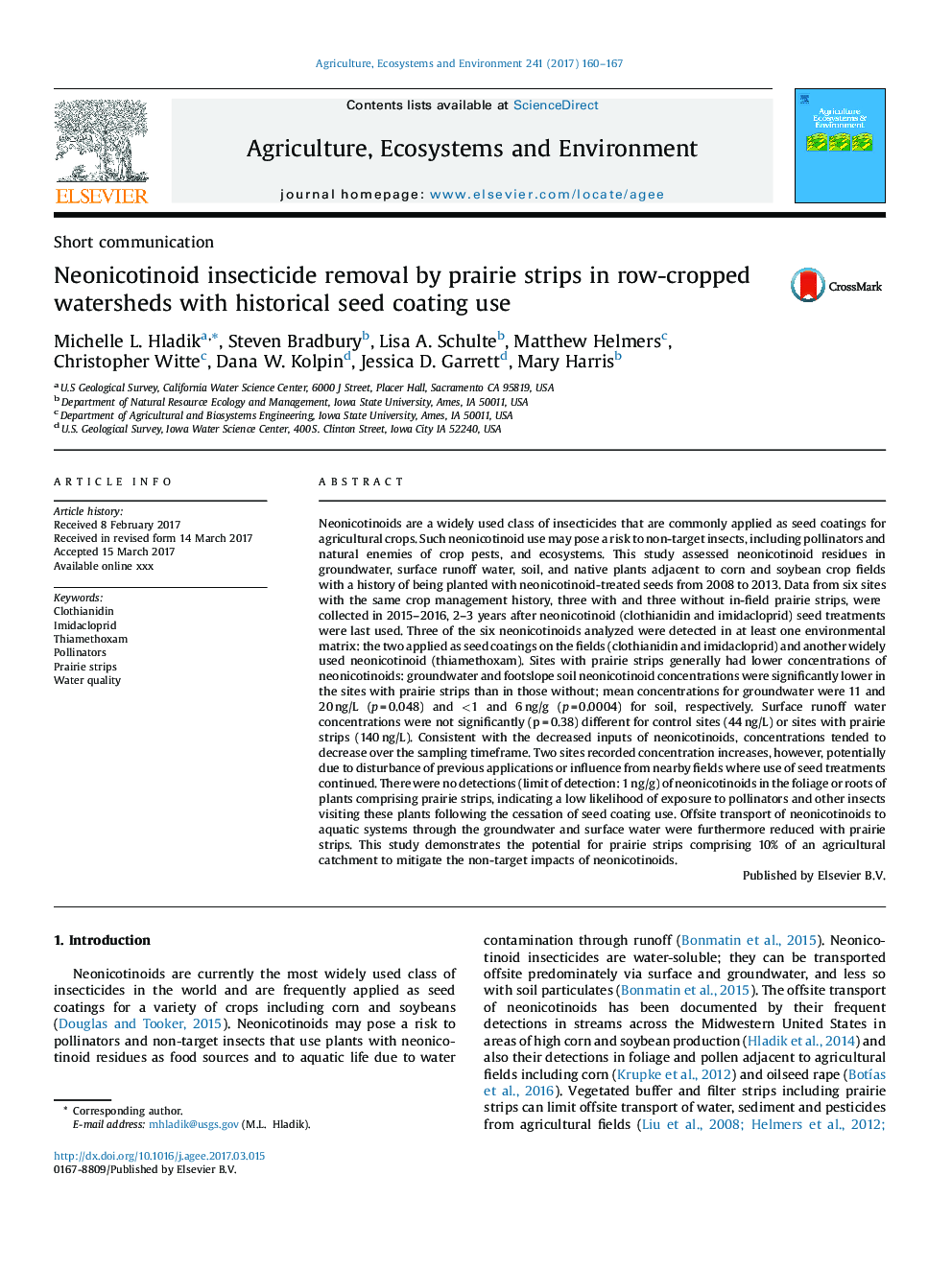 Neonicotinoid insecticide removal by prairie strips in row-cropped watersheds with historical seed coating use