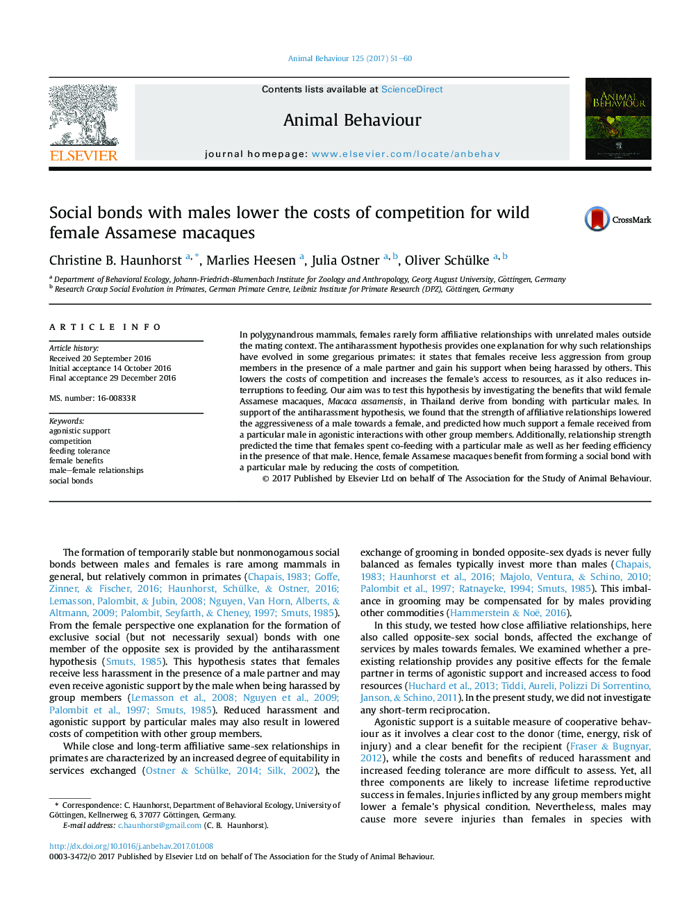 Social bonds with males lower the costs of competition for wild female Assamese macaques