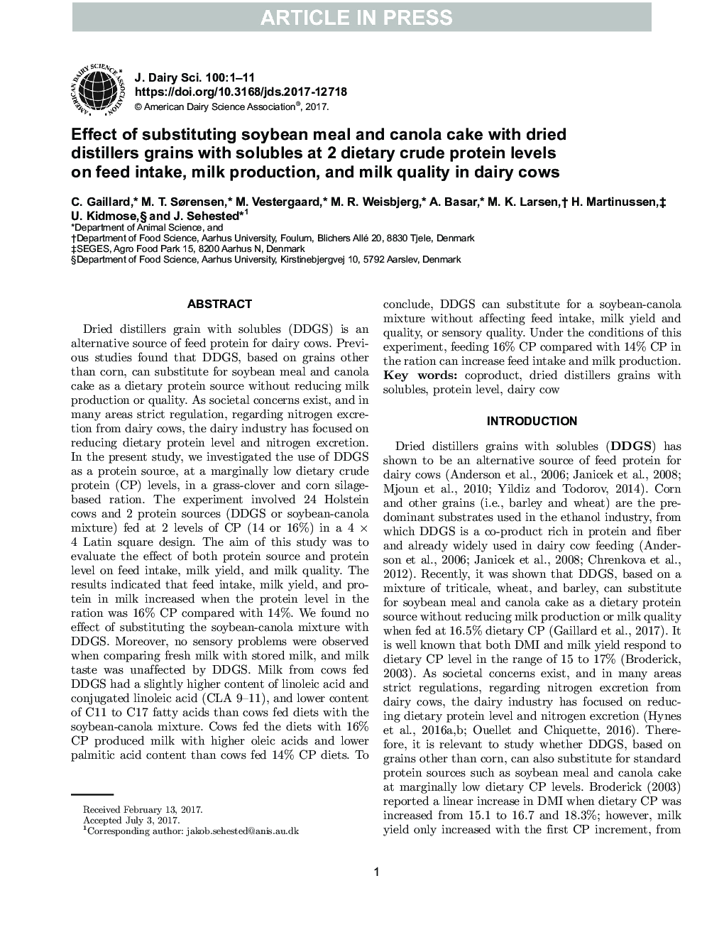 Effect of substituting soybean meal and canola cake with dried distillers grains with solubles at 2 dietary crude protein levels on feed intake, milk production, and milk quality in dairy cows