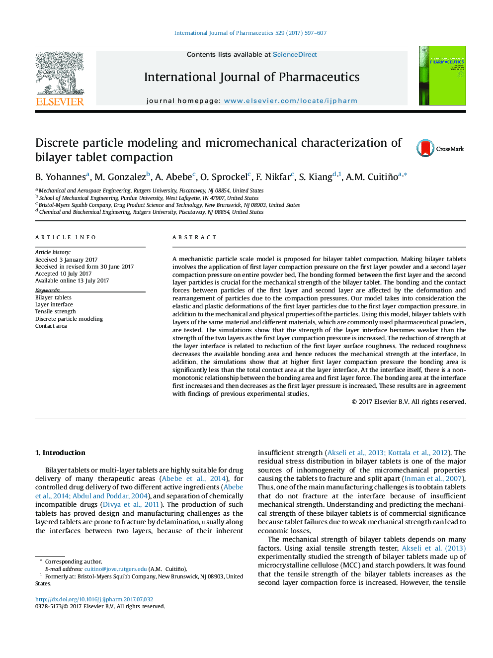 Discrete particle modeling and micromechanical characterization of bilayer tablet compaction