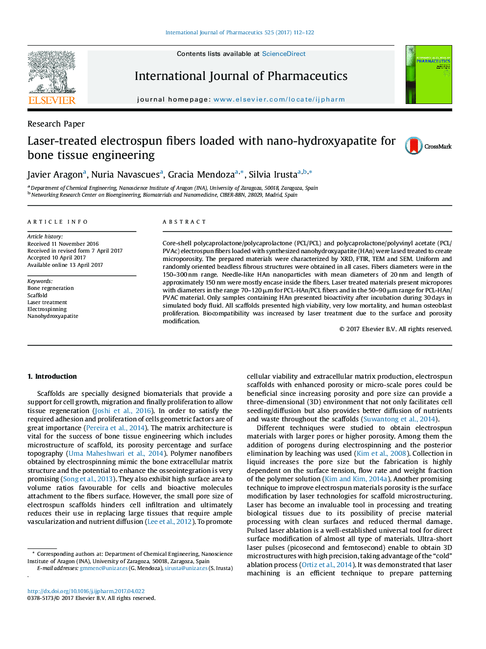 Laser-treated electrospun fibers loaded with nano-hydroxyapatite for bone tissue engineering