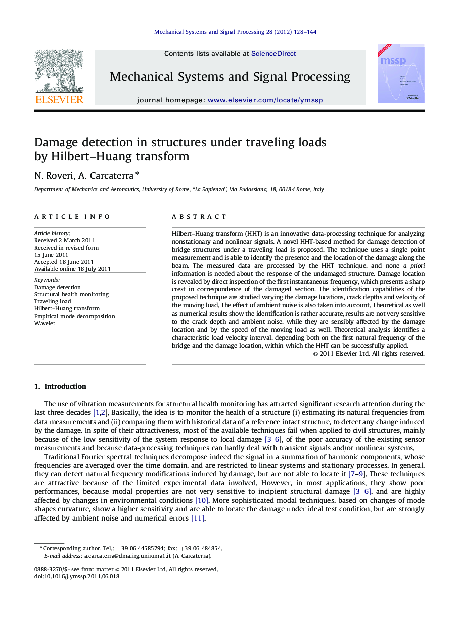 Damage detection in structures under traveling loads by Hilbert–Huang transform