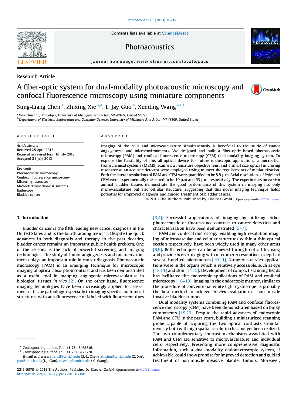 A fiber-optic system for dual-modality photoacoustic microscopy and confocal fluorescence microscopy using miniature components 