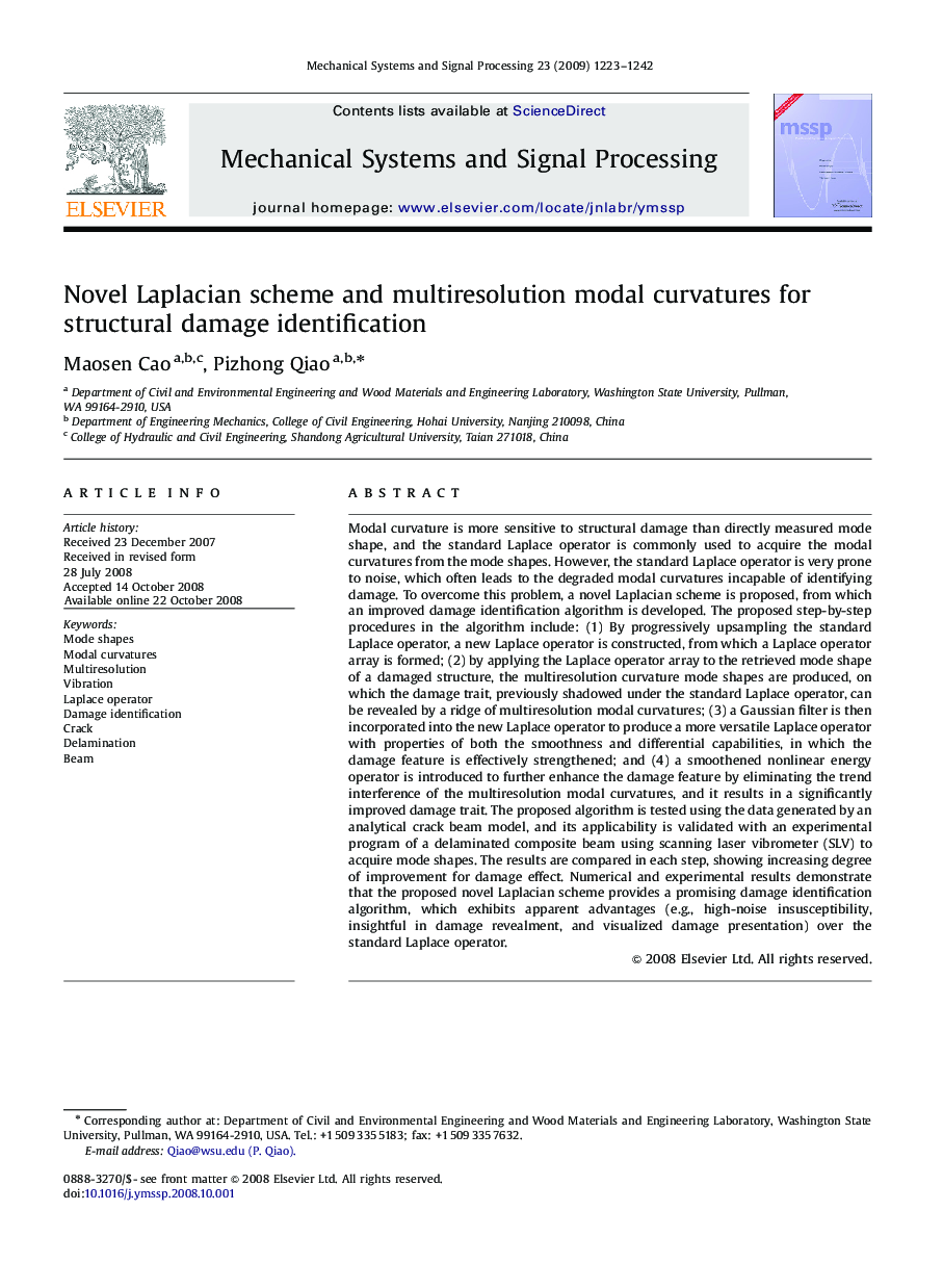 Novel Laplacian scheme and multiresolution modal curvatures for structural damage identification