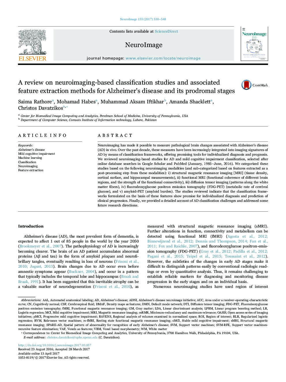 A review on neuroimaging-based classification studies and associated feature extraction methods for Alzheimer's disease and its prodromal stages