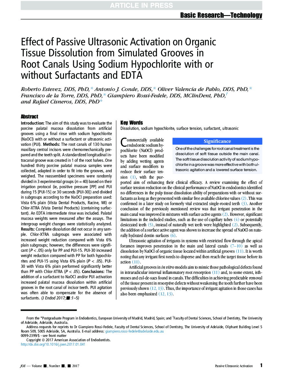 Effect of Passive Ultrasonic Activation on Organic Tissue Dissolution from Simulated Grooves in Root Canals Using Sodium Hypochlorite with or without Surfactants and EDTA