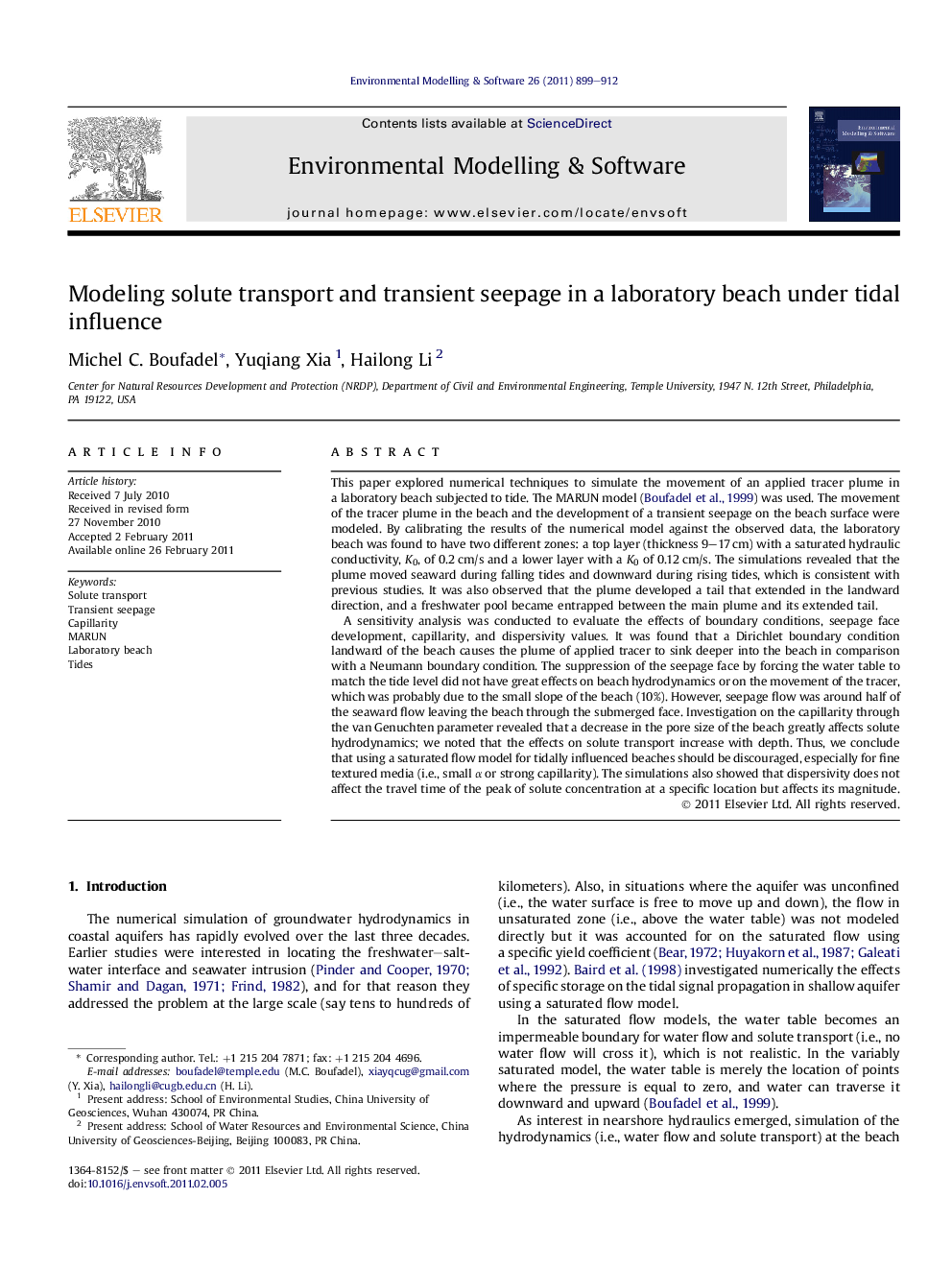 Modeling solute transport and transient seepage in a laboratory beach under tidal influence