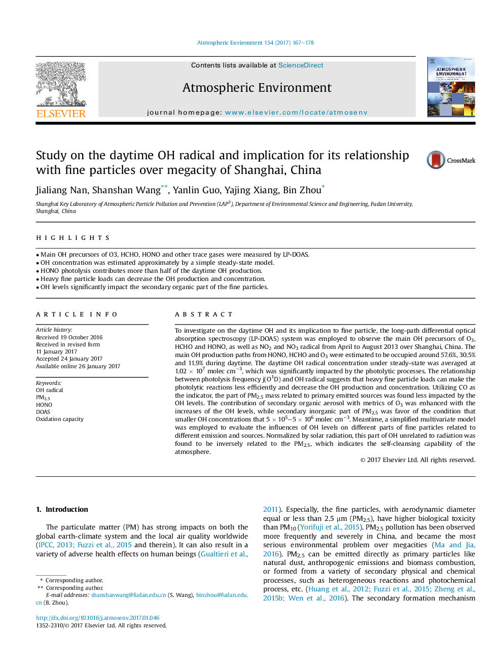 Study on the daytime OH radical and implication for its relationship with fine particles over megacity of Shanghai, China