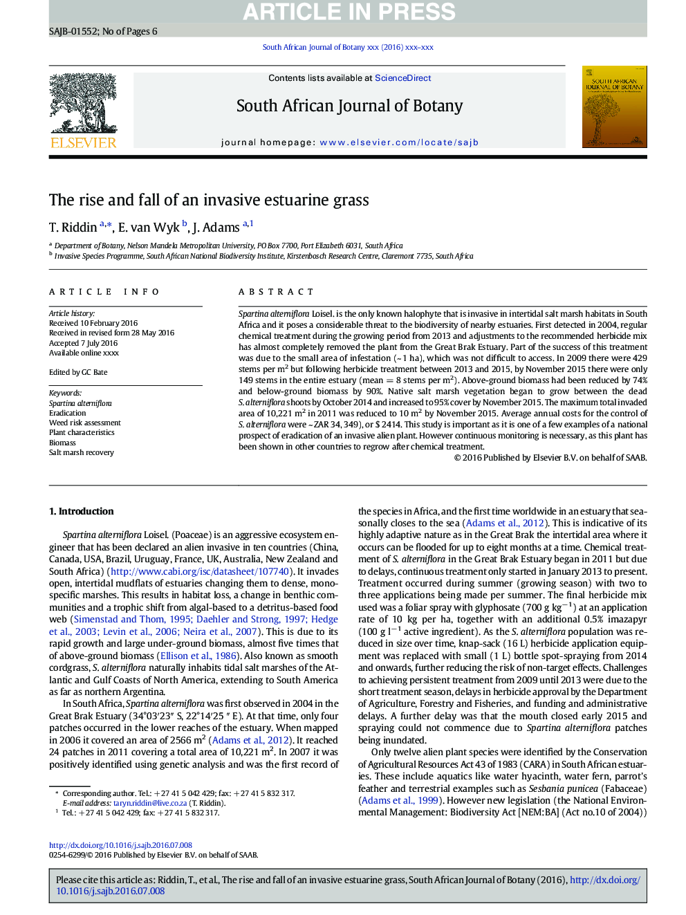 The rise and fall of an invasive estuarine grass