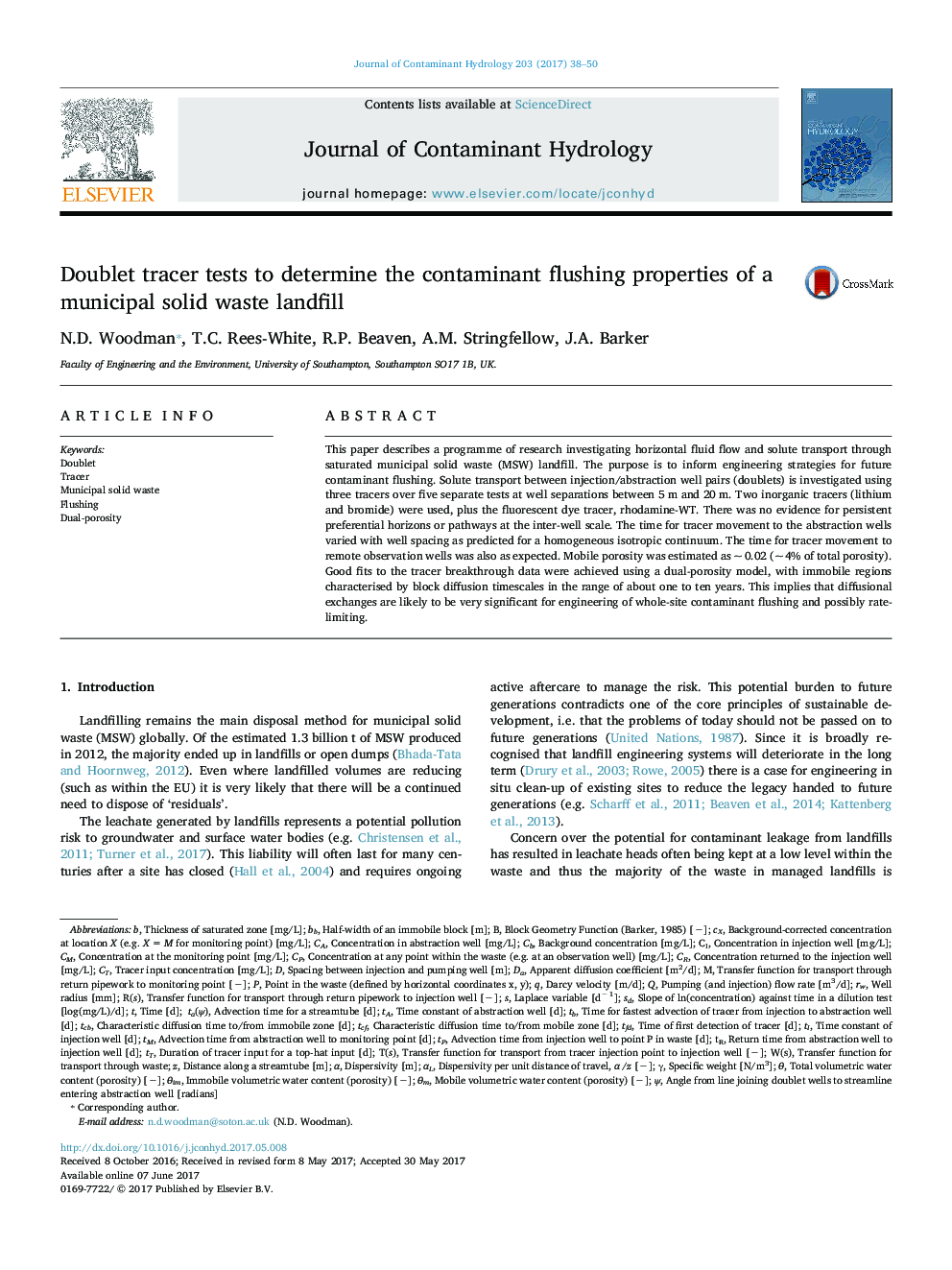 Doublet tracer tests to determine the contaminant flushing properties of a municipal solid waste landfill