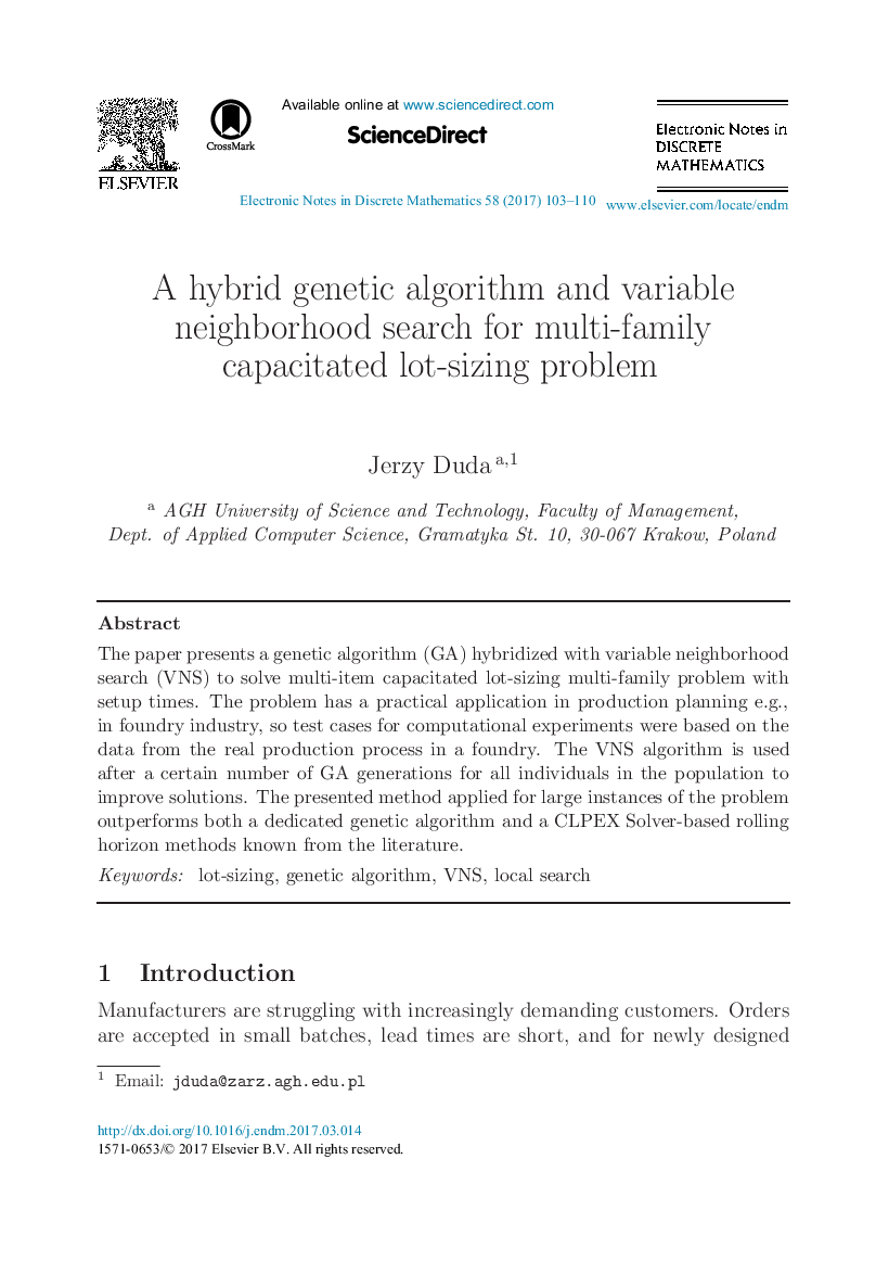 A hybrid genetic algorithm and variable neighborhood search for multi-family capacitated lot-sizing problem