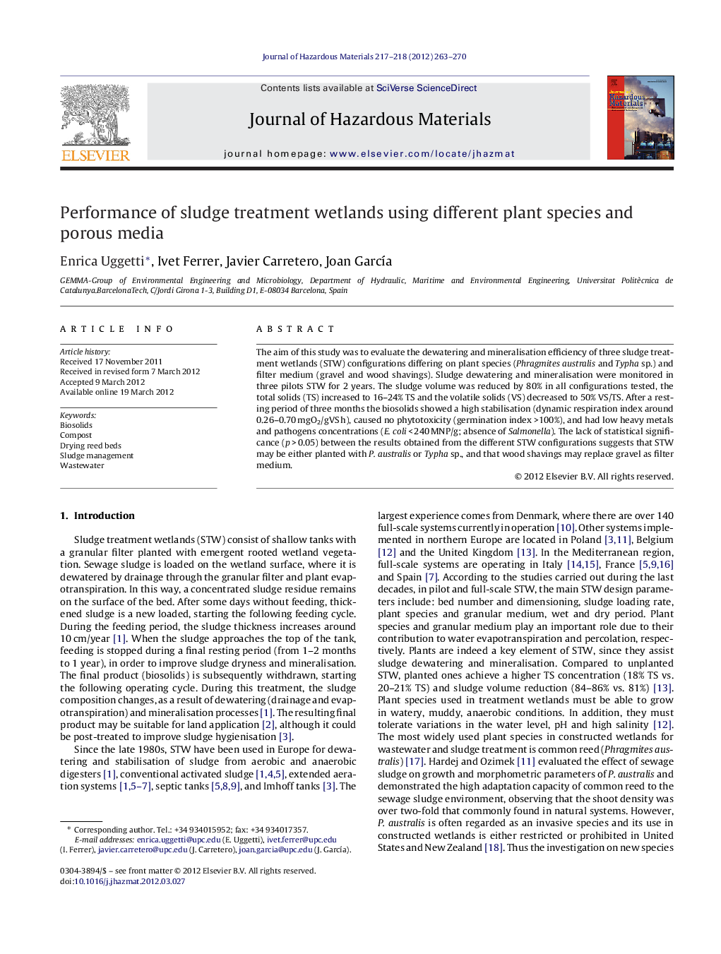 Performance of sludge treatment wetlands using different plant species and porous media