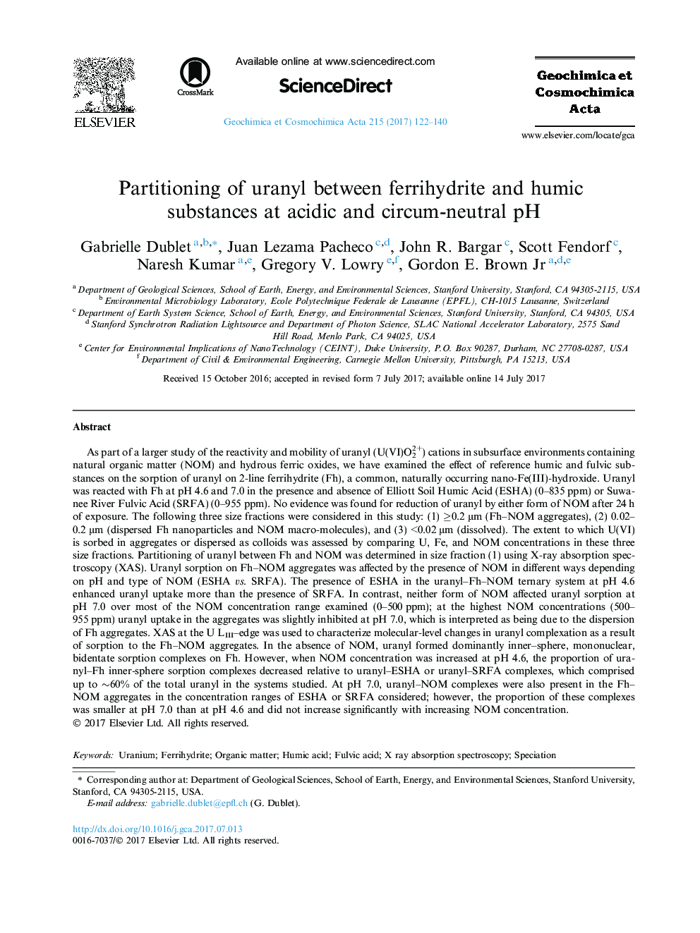 Partitioning of uranyl between ferrihydrite and humic substances at acidic and circum-neutral pH