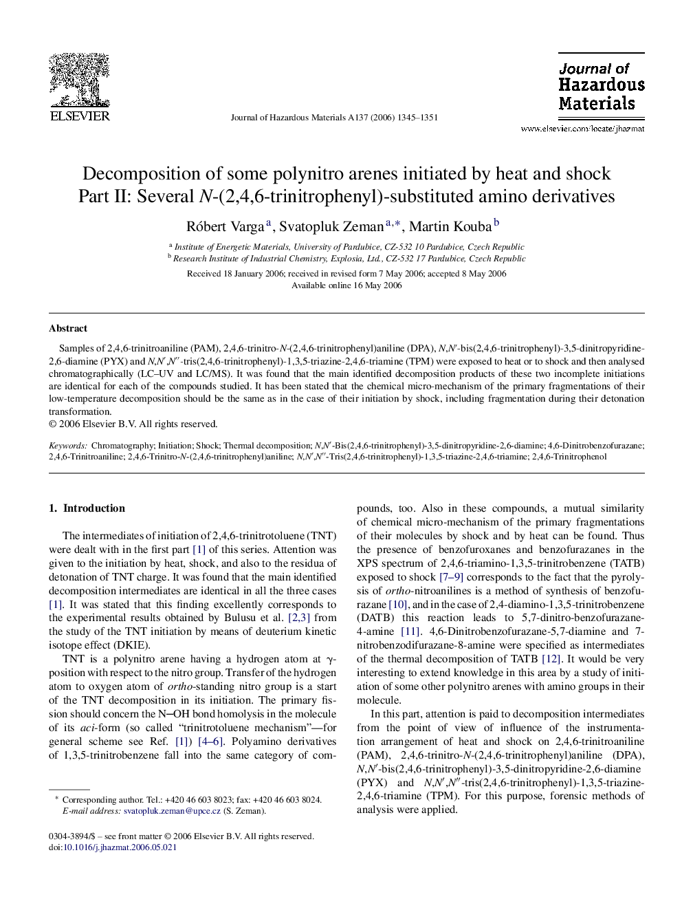 Decomposition of some polynitro arenes initiated by heat and shock