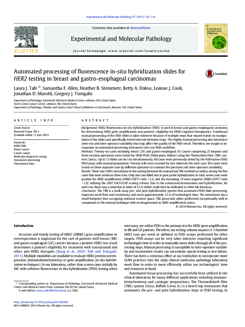 Automated processing of fluorescence in-situ hybridization slides for HER2 testing in breast and gastro-esophageal carcinomas