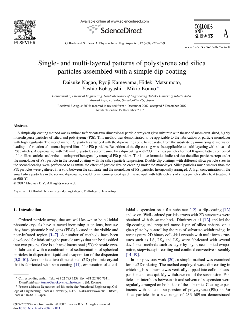 Single- and multi-layered patterns of polystyrene and silica particles assembled with a simple dip-coating