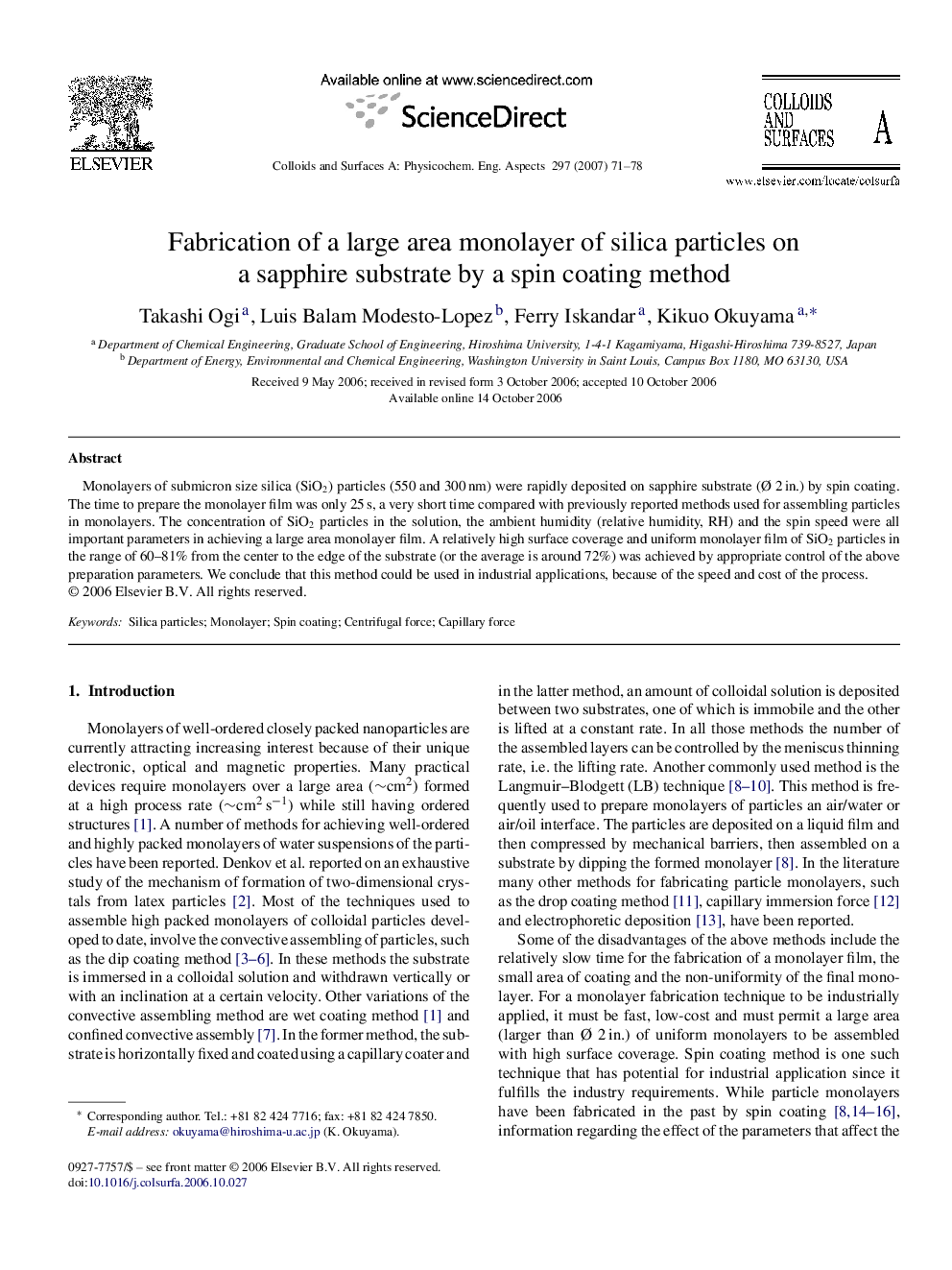 Fabrication of a large area monolayer of silica particles on a sapphire substrate by a spin coating method