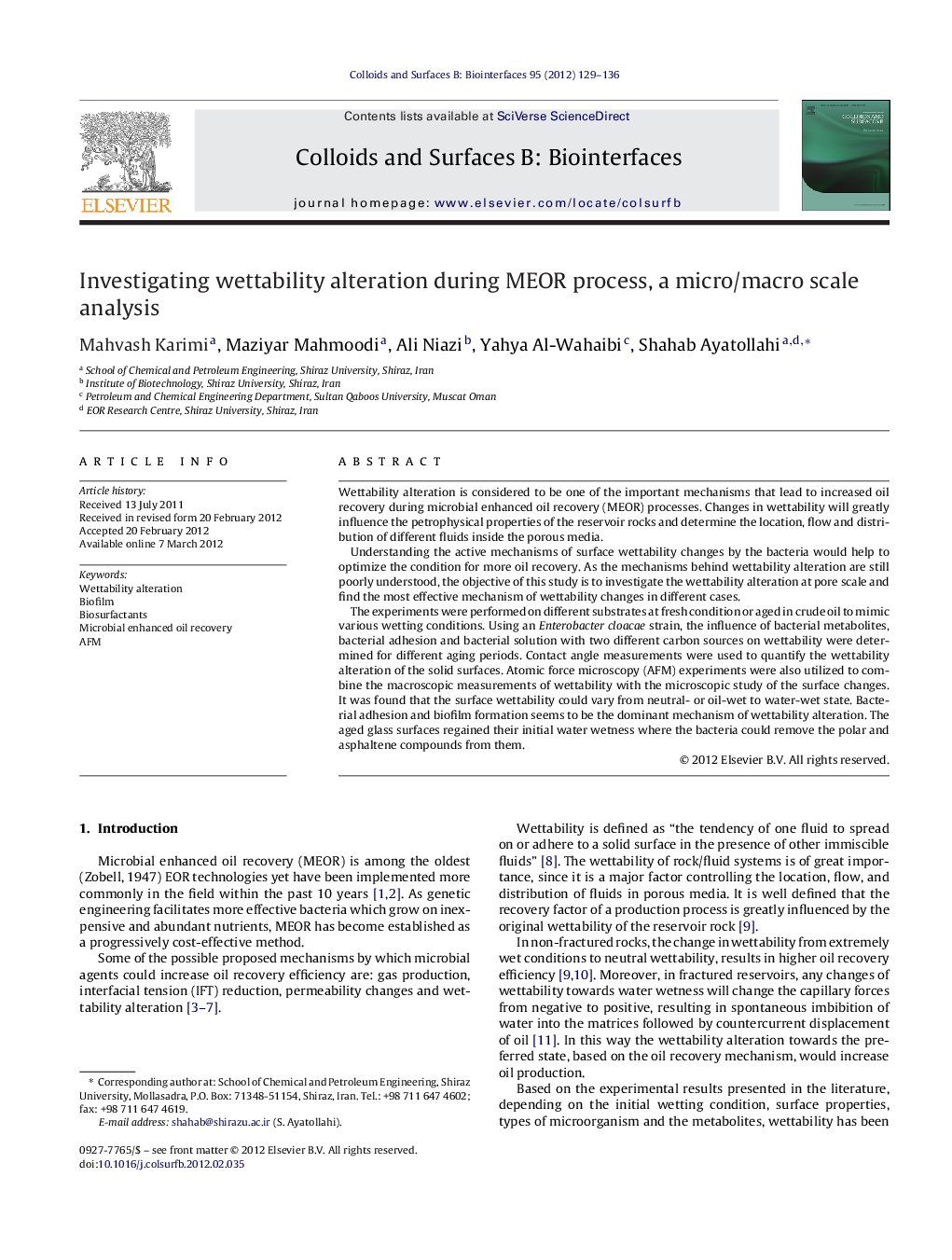 Investigating wettability alteration during MEOR process, a micro/macro scale analysis