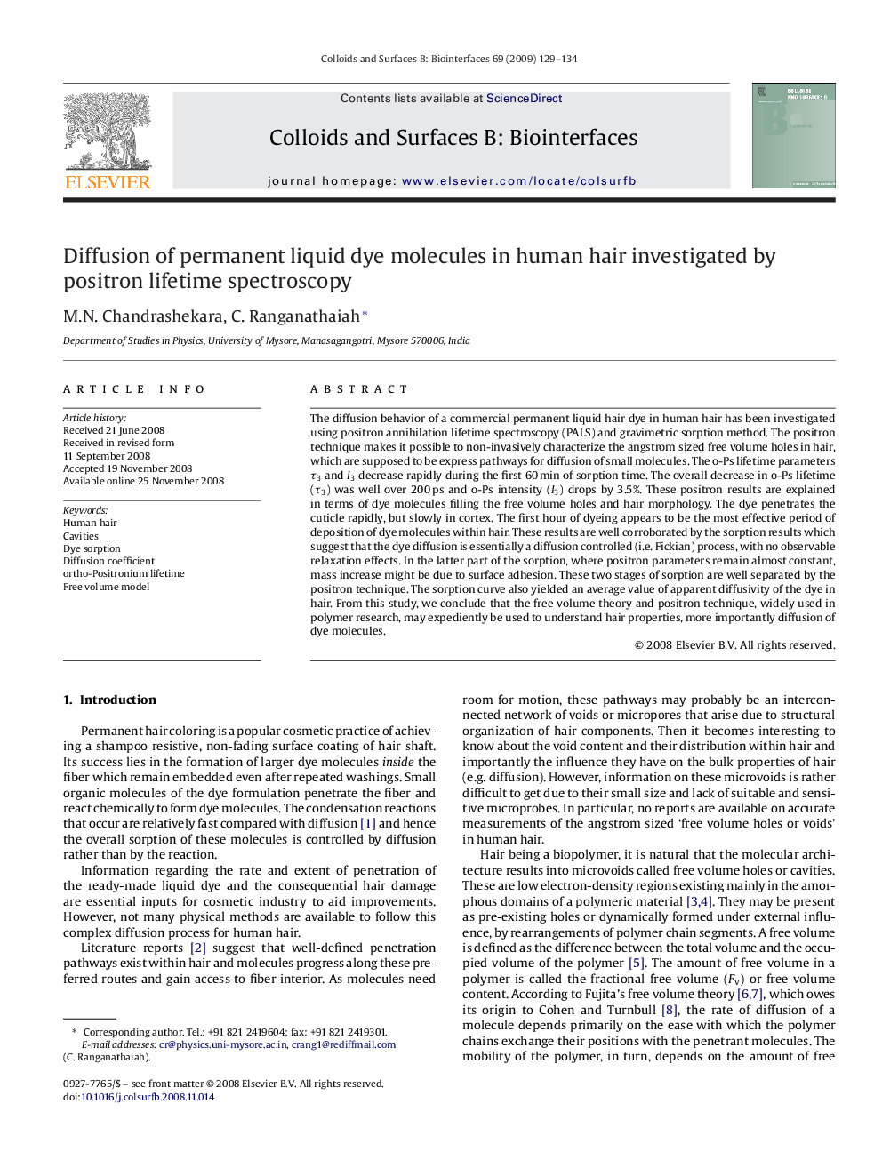 Diffusion of permanent liquid dye molecules in human hair investigated by positron lifetime spectroscopy