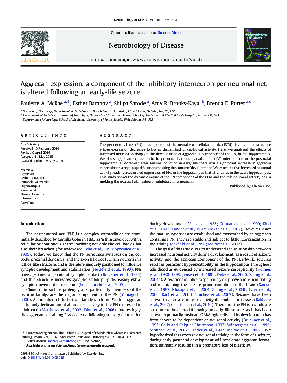 Aggrecan expression, a component of the inhibitory interneuron perineuronal net, is altered following an early-life seizure