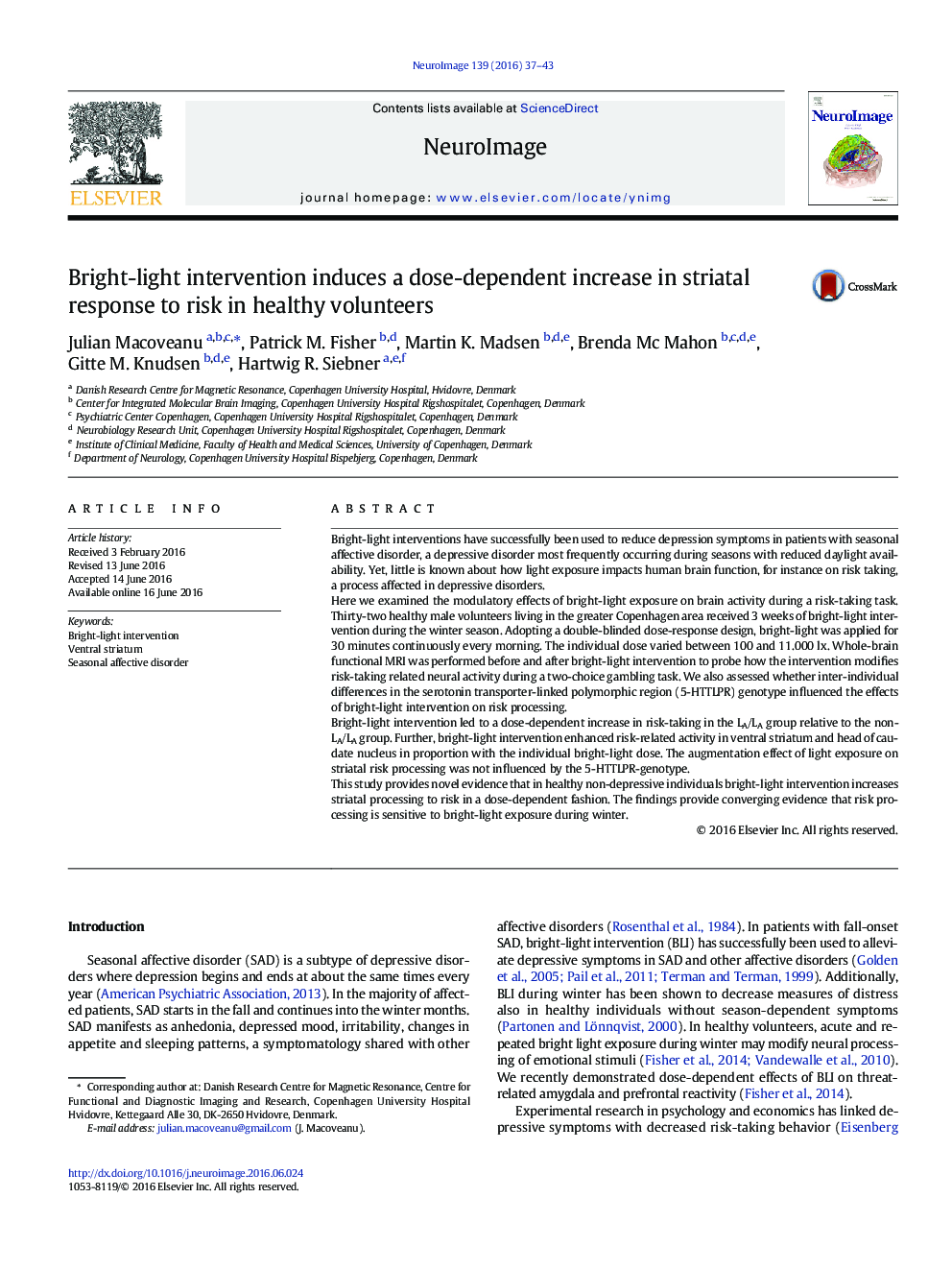 Bright-light intervention induces a dose-dependent increase in striatal response to risk in healthy volunteers