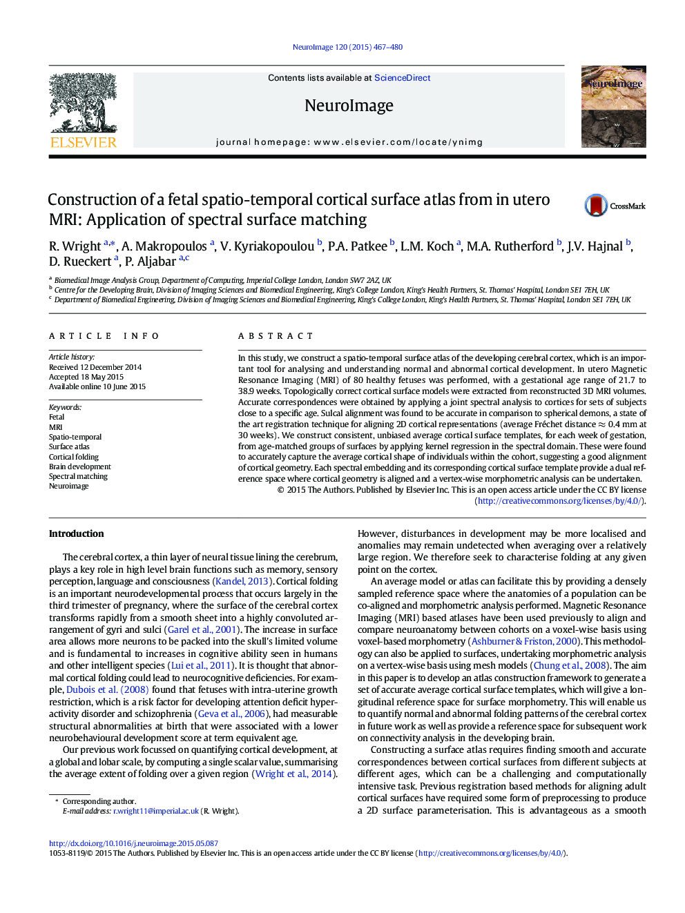 Construction of a fetal spatio-temporal cortical surface atlas from in utero MRI: Application of spectral surface matching