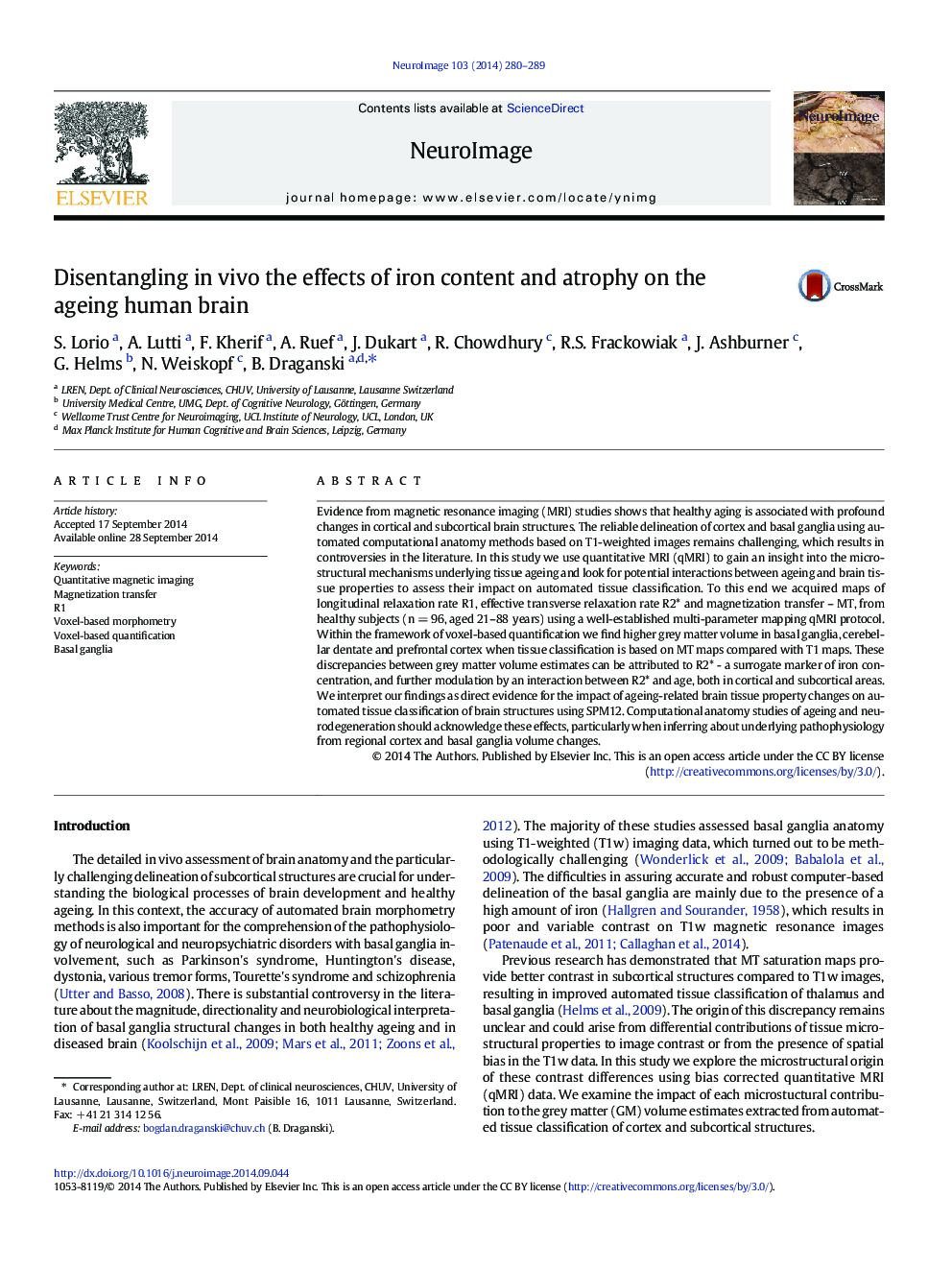 Disentangling in vivo the effects of iron content and atrophy on the ageing human brain