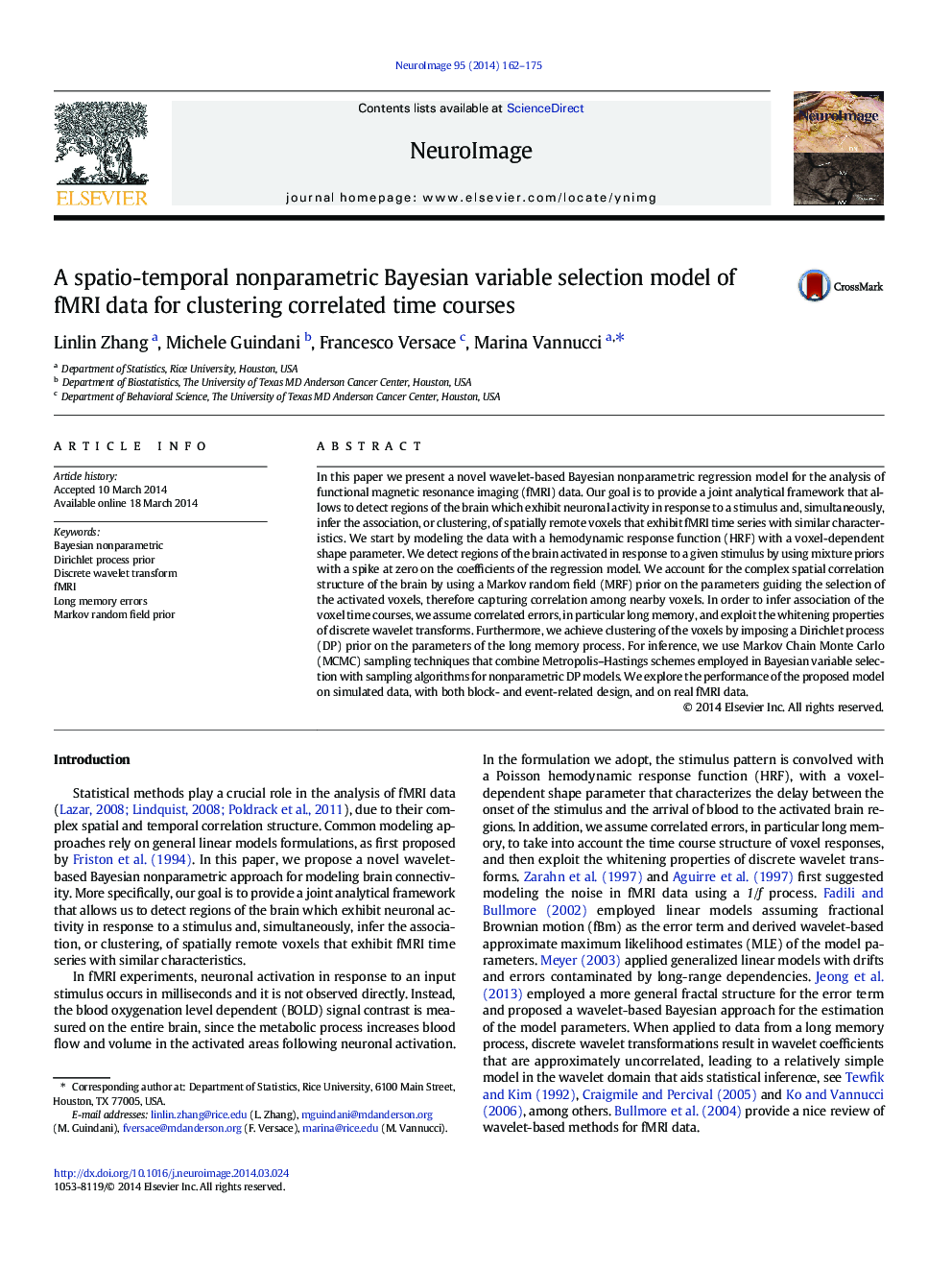 A spatio-temporal nonparametric Bayesian variable selection model of fMRI data for clustering correlated time courses