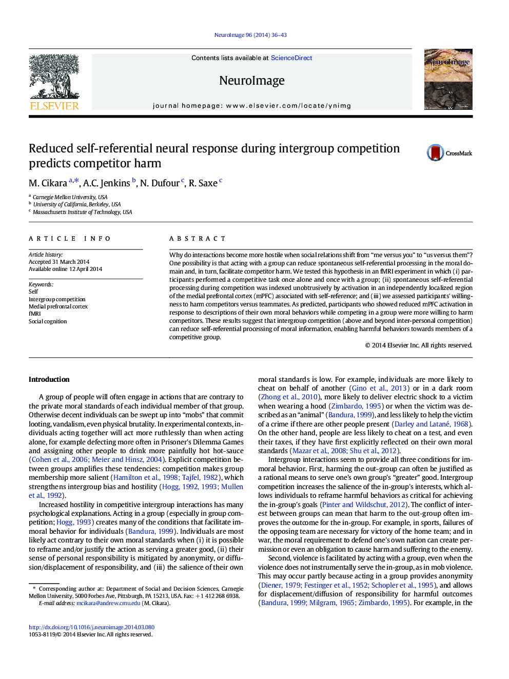 Reduced self-referential neural response during intergroup competition predicts competitor harm