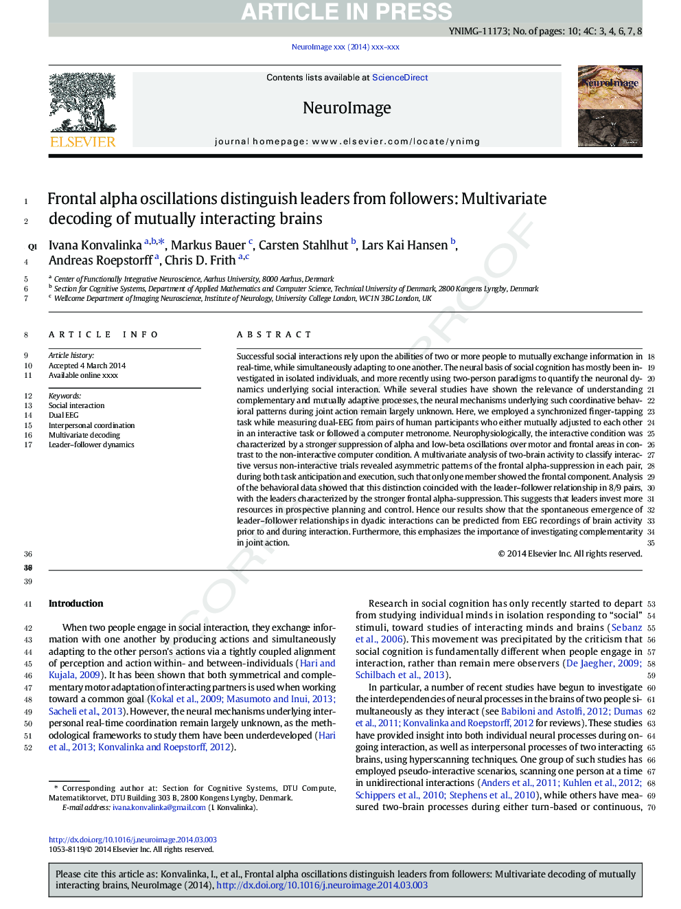 Frontal alpha oscillations distinguish leaders from followers: Multivariate decoding of mutually interacting brains