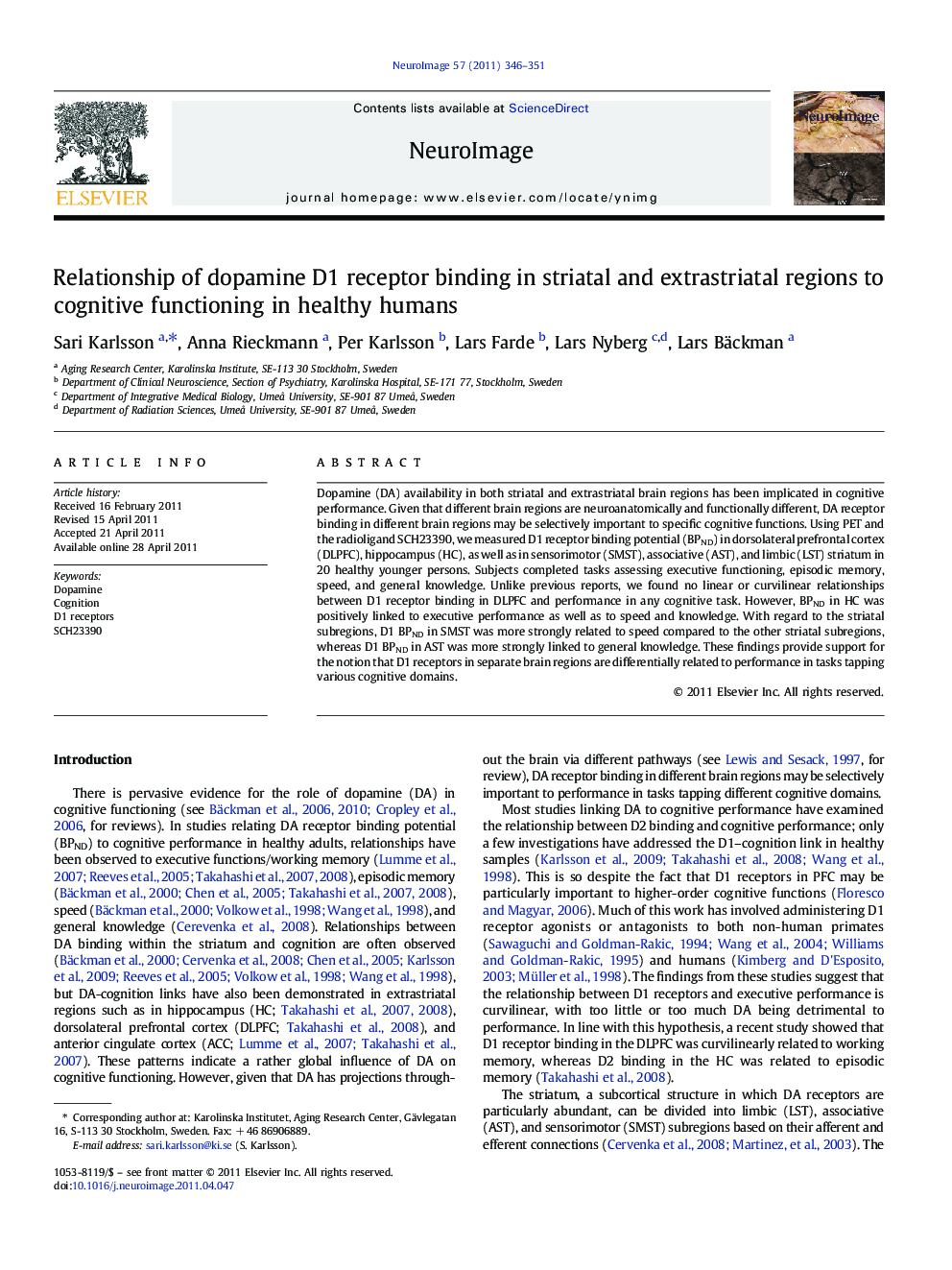 Relationship of dopamine D1 receptor binding in striatal and extrastriatal regions to cognitive functioning in healthy humans