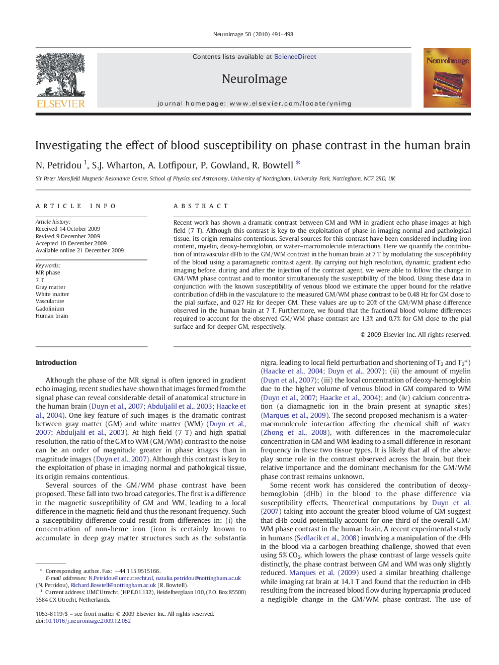 Investigating the effect of blood susceptibility on phase contrast in the human brain