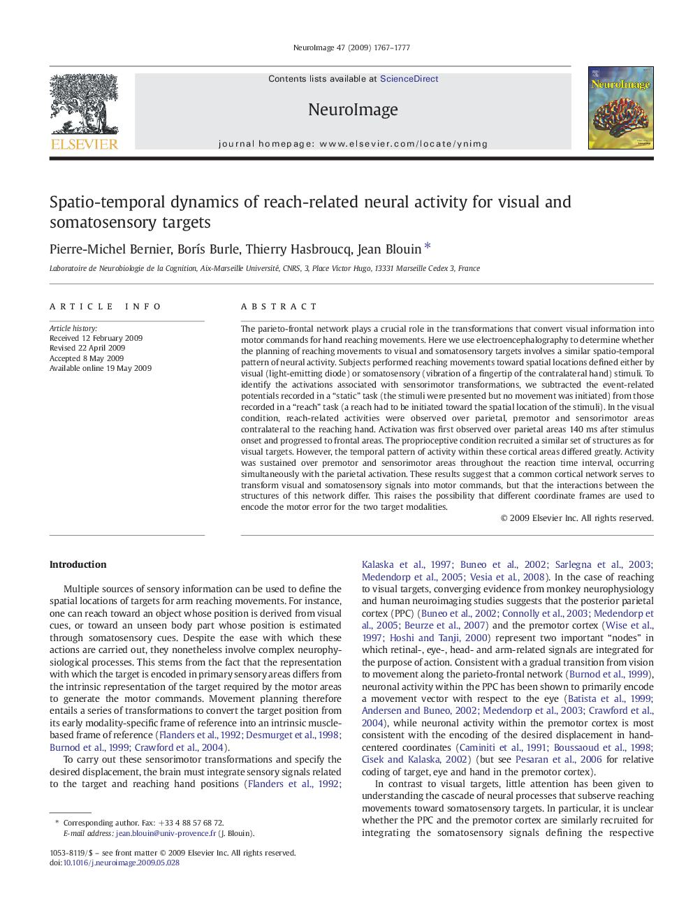 Spatio-temporal dynamics of reach-related neural activity for visual and somatosensory targets