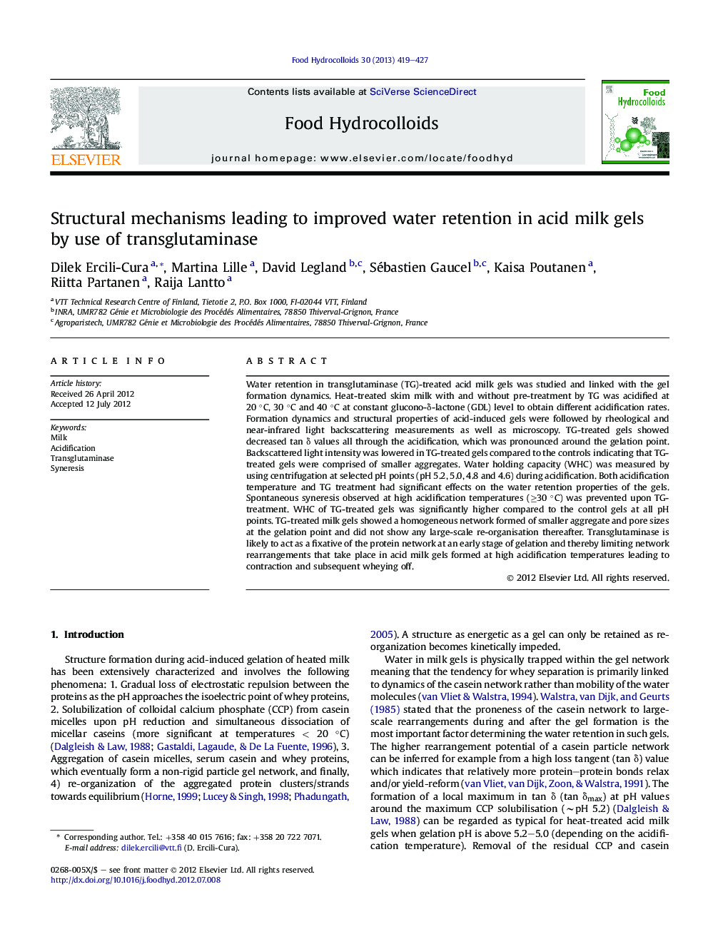 Structural mechanisms leading to improved water retention in acid milk gels by use of transglutaminase