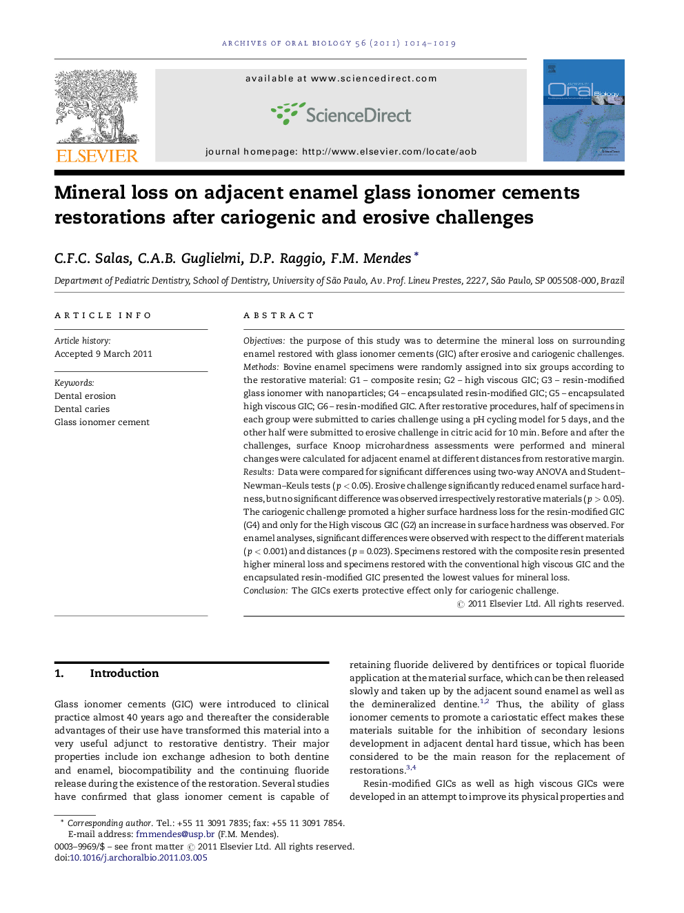 Mineral loss on adjacent enamel glass ionomer cements restorations after cariogenic and erosive challenges