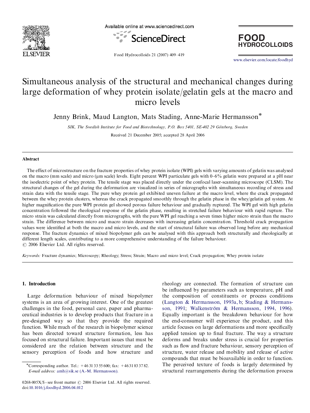 Simultaneous analysis of the structural and mechanical changes during large deformation of whey protein isolate/gelatin gels at the macro and micro levels