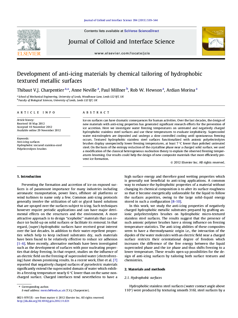 Development of anti-icing materials by chemical tailoring of hydrophobic textured metallic surfaces