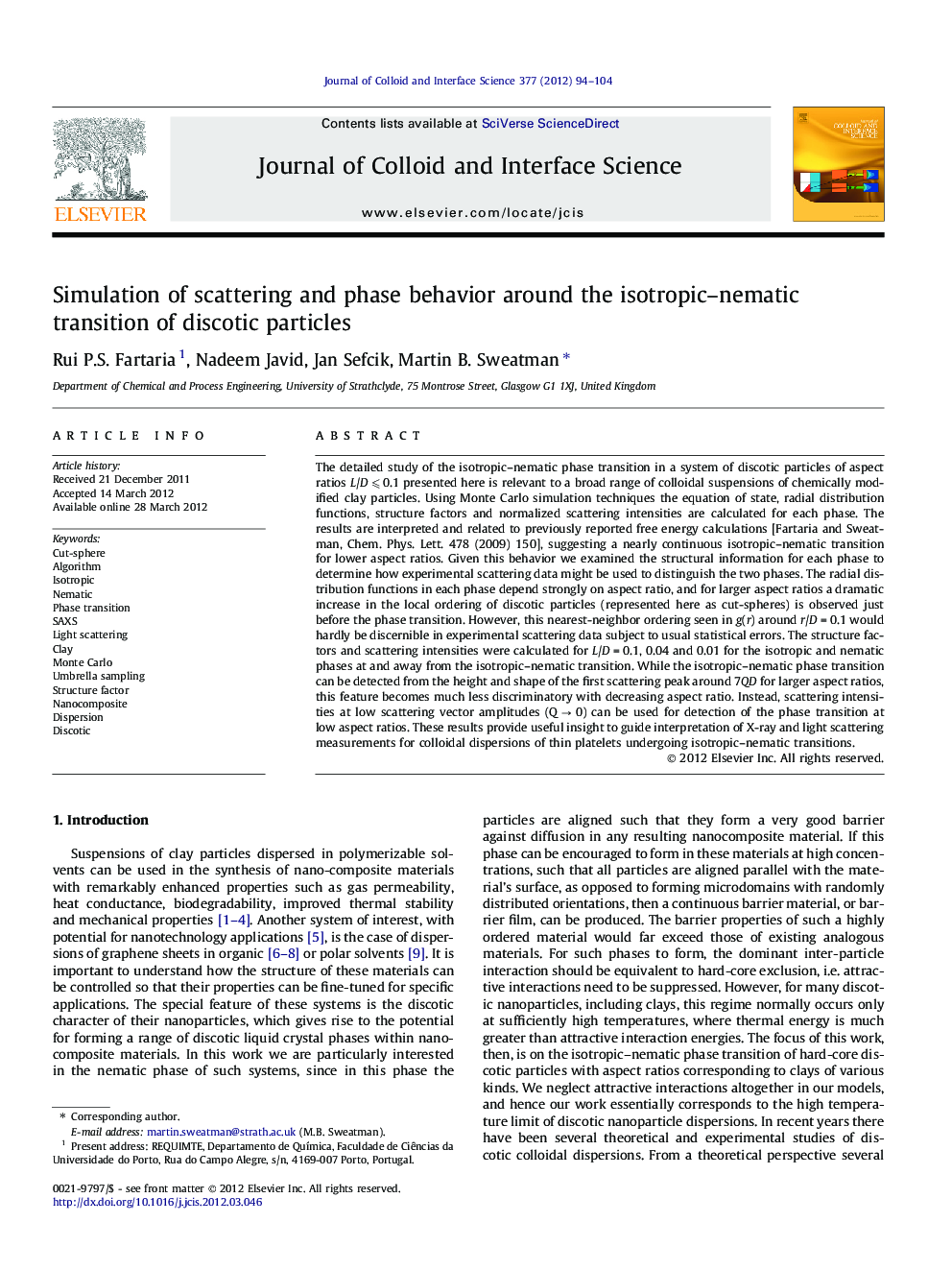 Simulation of scattering and phase behavior around the isotropic–nematic transition of discotic particles