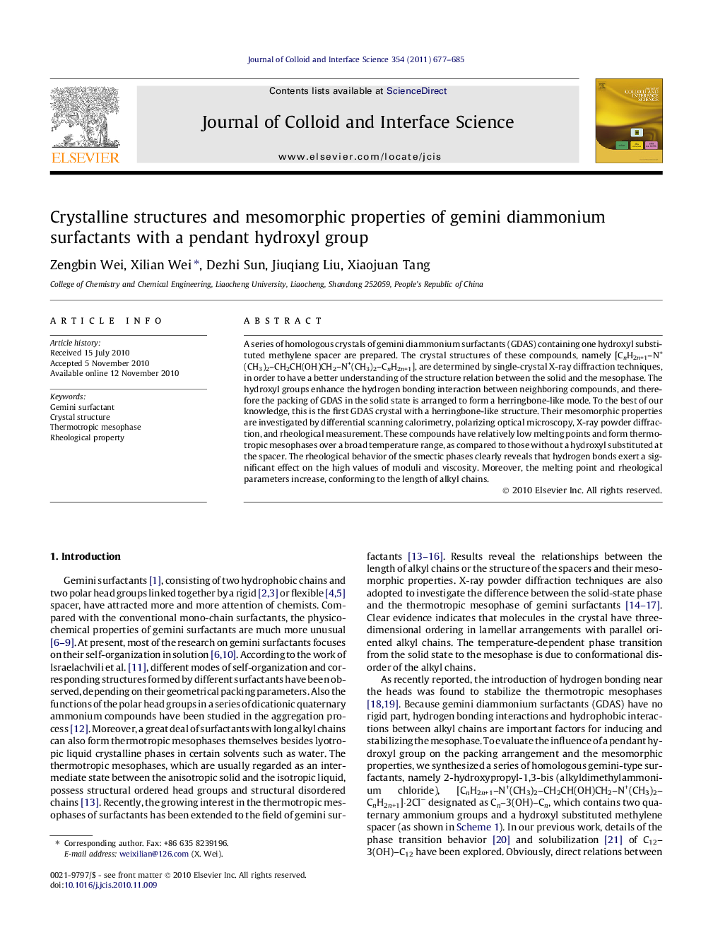 Crystalline structures and mesomorphic properties of gemini diammonium surfactants with a pendant hydroxyl group