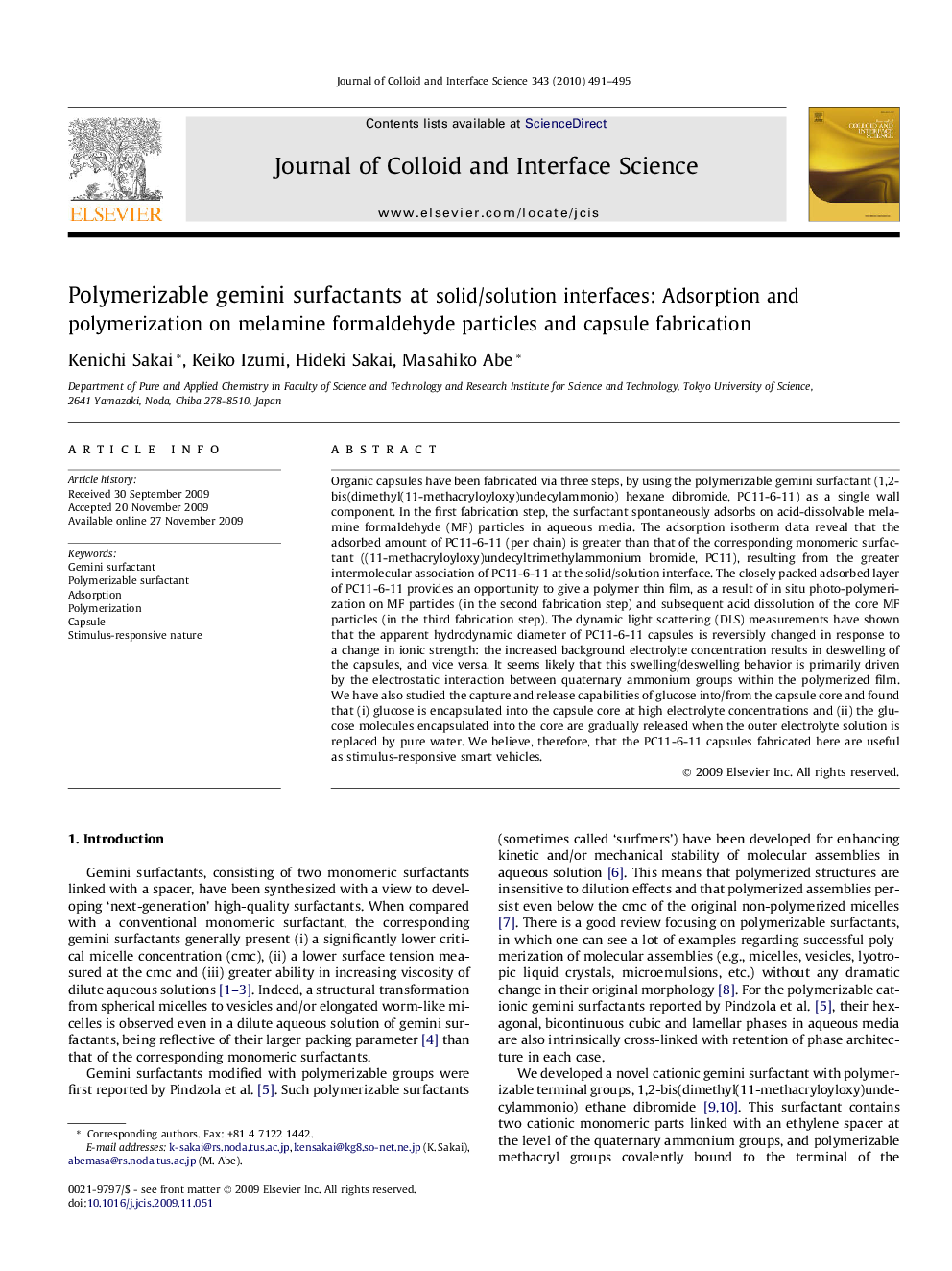 Polymerizable gemini surfactants at solid/solution interfaces: Adsorption and polymerization on melamine formaldehyde particles and capsule fabrication