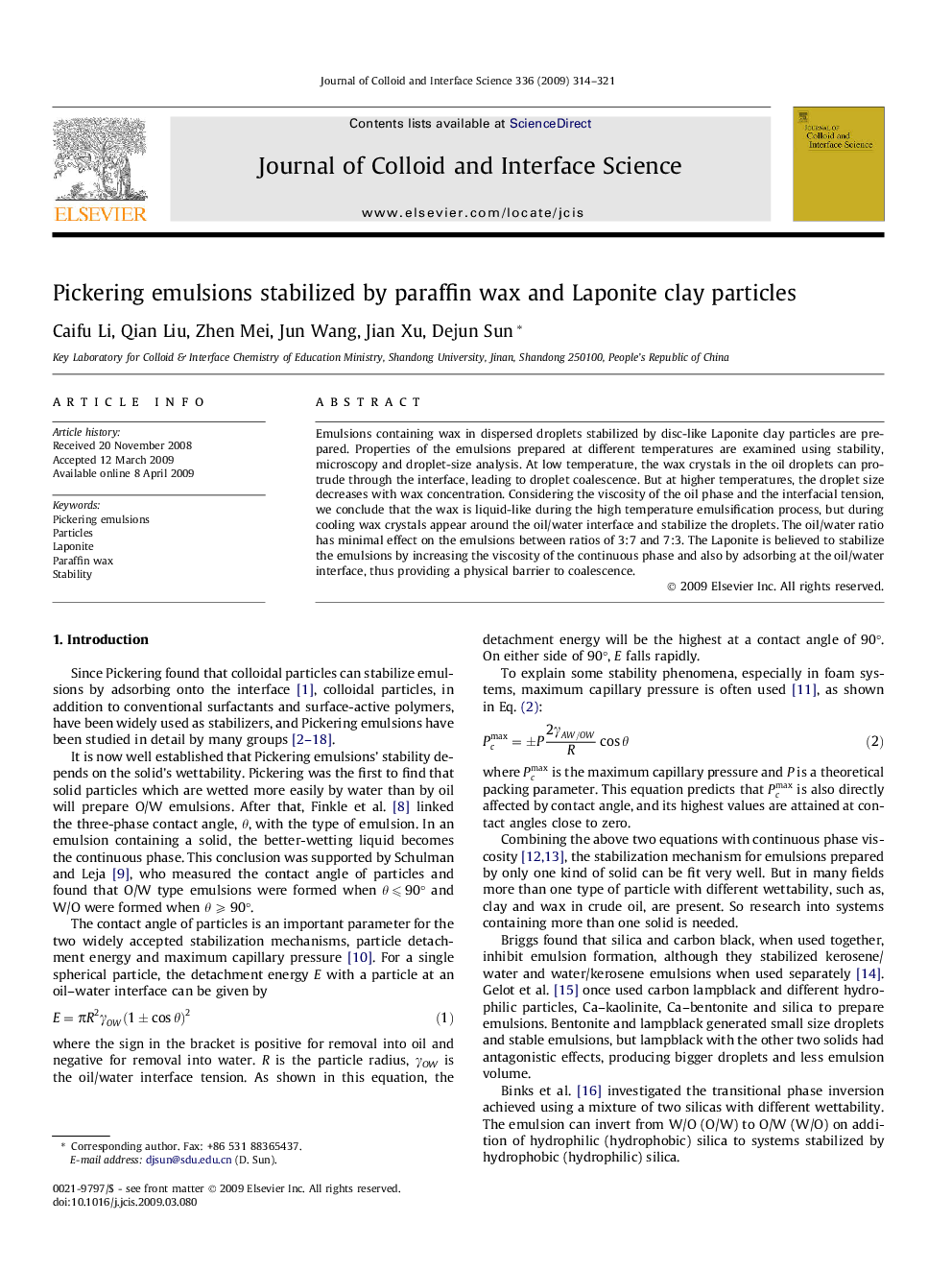 Pickering emulsions stabilized by paraffin wax and Laponite clay particles